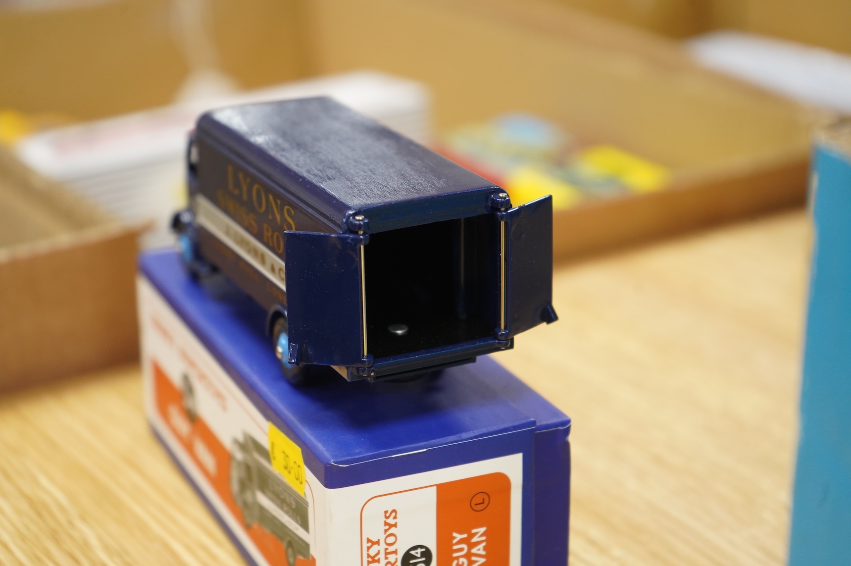 Twenty-two boxed Atlas Dinky Toys, including cars and commercial vehicles, Leyland tankers, a Foden wagon, sports cars, etc.